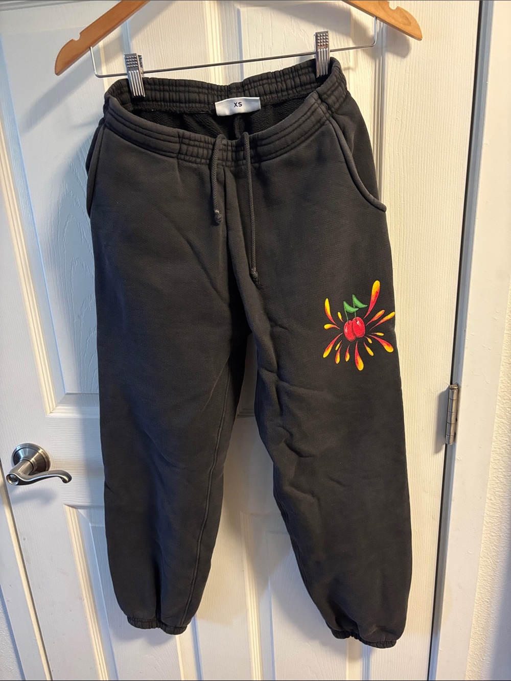 Cherry LA Black Sweatpants with Colorful Fruit Splash